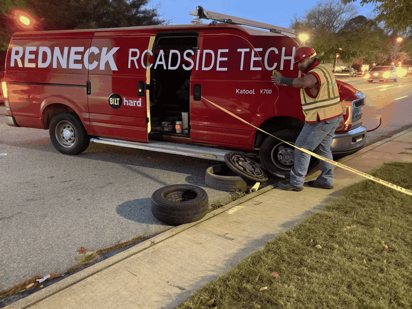 Redneck Roadside Tech mobile tire service truck assisting a driver in Cincinnati